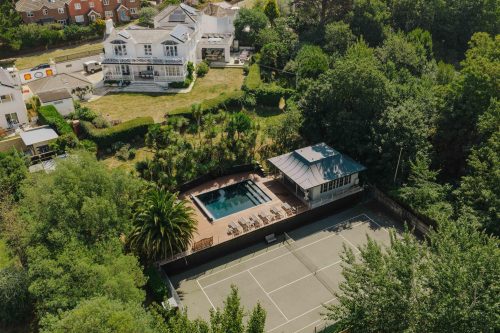 large unique home set in expansive grounds with private swimming pool and tennis courts. accommodating large groups