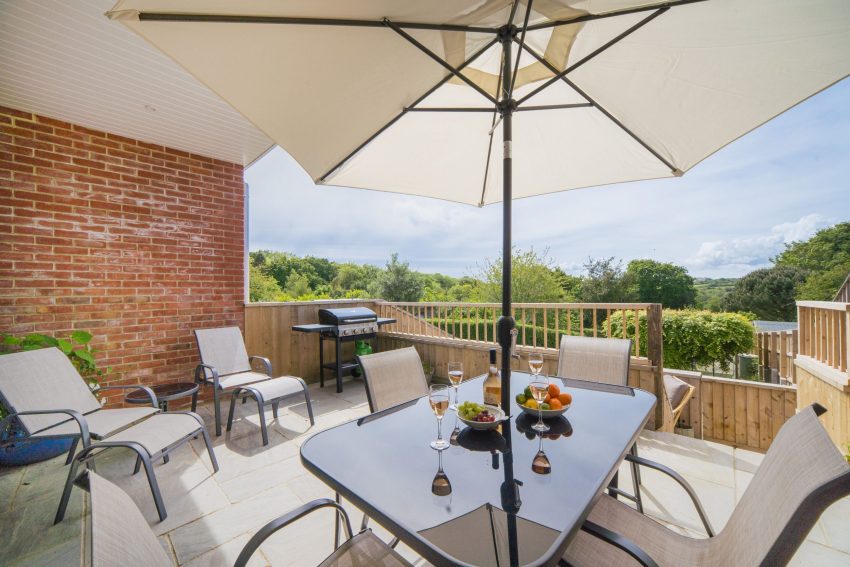 covered patio with bi fold doors